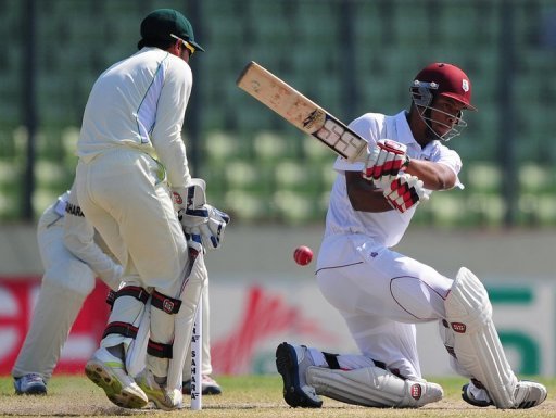 Kieran Powell (right) plays a shot as Bangladesh captain Mushfiqur Rahim reacts Kieran Powell (right) plays a shot as Bangladesh captain Mushfiqur Rahim reacts