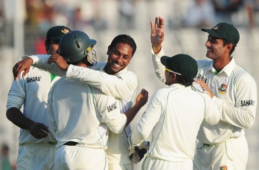 Bangladesh bowler Sohag Gazi (centre) celebrates with teammates Bangladesh bowler Sohag Gazi (centre) celebrates with teammates