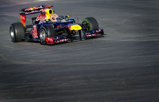 Sebastian Vettel of Red Bull Racing enters turn 1 during the first practice session Sebastian Vettel of Red Bull Racing enters turn 1 during the first practice session