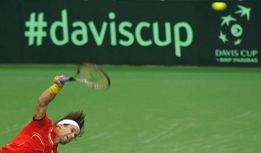 David Ferrer of Spain serves a ball David Ferrer of Spain serves a ball