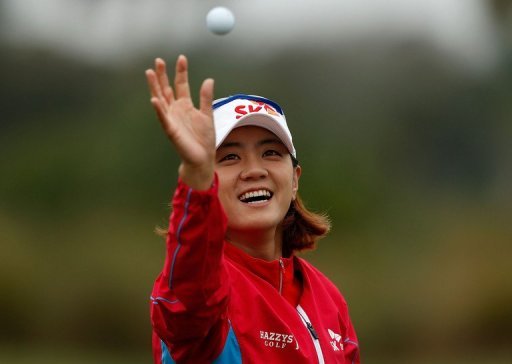 Na Yeon Choi of South Korea reaches for a golf ball Na Yeon Choi of South Korea reaches for a golf ball