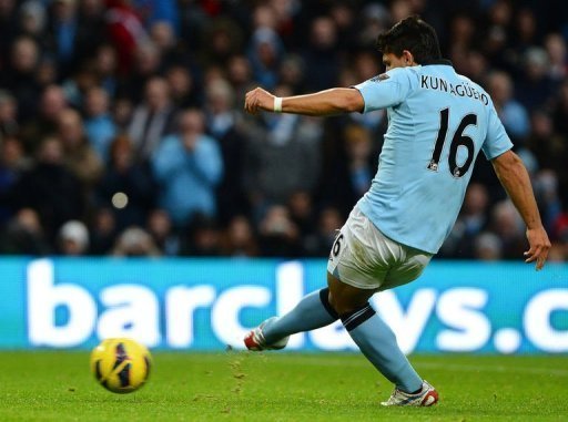 Manchester City's forward Sergio Aguero scores his team's second goal Manchester City's forward Sergio Aguero scores his team's second goal