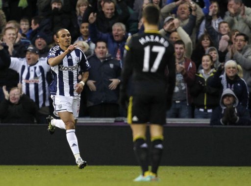 West Bromwich Albion's Peter Odemwingie (L) celebrates scoring West Bromwich Albion's Peter Odemwingie (L) celebrates scoring