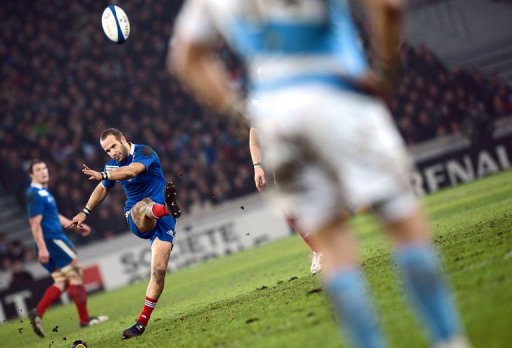France's fly half Frederic Michalak (L) hits a penalty kick France's fly half Frederic Michalak (L) hits a penalty kick