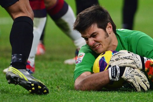 Cagliari's goalkeeper Michael Agazzi saves the ball Cagliari's goalkeeper Michael Agazzi saves the ball