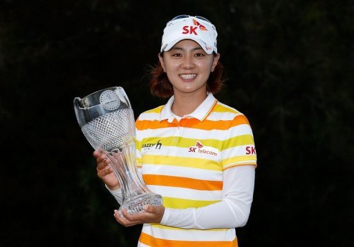 Na Yeon Choi of South Korea poses with the winner's trophy Na Yeon Choi of South Korea poses with the winner's trophy