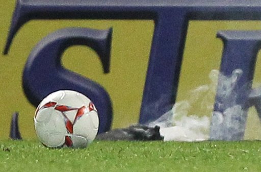 A Russian Premier League game was abandoned after a firecracker struck a goalkeeper A Russian Premier League game was abandoned after a firecracker struck a goalkeeper