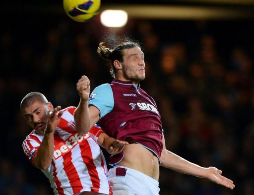 West Ham's Andy Carroll (R) jumps for the ball against Stoke's Jon Walters West Ham's Andy Carroll (R) jumps for the ball against Stoke's Jon Walters