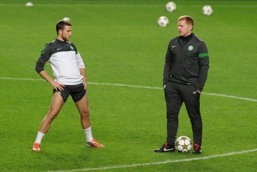Celtic defender Adam Matthews (L) and coach Neil Lennon take part in a training session at Luz Stadium Celtic defender Adam Matthews (L) and coach Neil Lennon take part in a training session at Luz Stadium