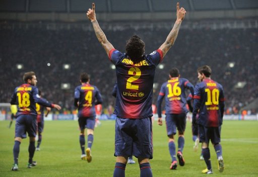 Barcelona's Daniel Alves celebrates scoring against Spartak Barcelona's Daniel Alves celebrates scoring against Spartak