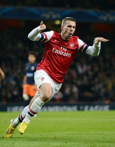 German international Lukas Podolski was on target to ease Arsenal into the knock-out stages German international Lukas Podolski was on target to ease Arsenal into the knock-out stages