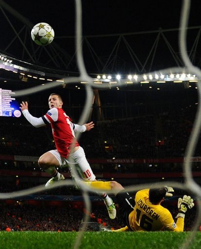 Arsenal's Jack Wilshere scores his team's first goal Arsenal's Jack Wilshere scores his team's first goal