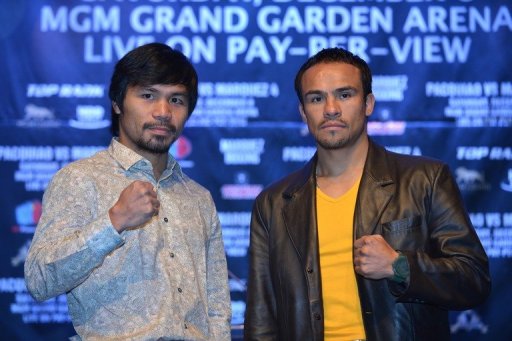 Boxers Manny Pacquiao (L) and Juan Manuel Marquez (R) Boxers Manny Pacquiao (L) and Juan Manuel Marquez (R)