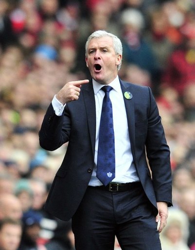Former Queens Park Rangers manager Mark Hughes gestures during an English Premier League football match Former Queens Park Rangers manager Mark Hughes gestures during an English Premier League football match