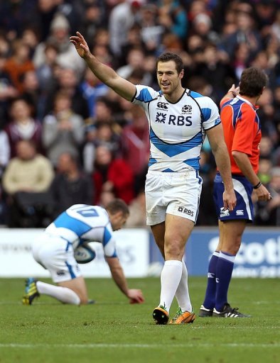 Scotland's Tim Visser celebrates scoring a try during their match against New Zealand's All Blacks Scotland's Tim Visser celebrates scoring a try during their match against New Zealand's All Blacks