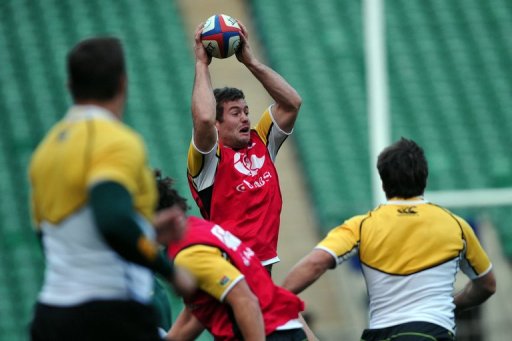 South Africa's centre Jaco Taute jumps for the ball during a training session at Twickenham in London South Africa's centre Jaco Taute jumps for the ball during a training session at Twickenham in London