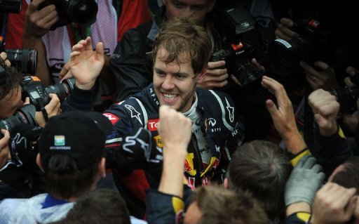 Sebastian Vettel celebrates with the Red Bull team Sebastian Vettel celebrates with the Red Bull team