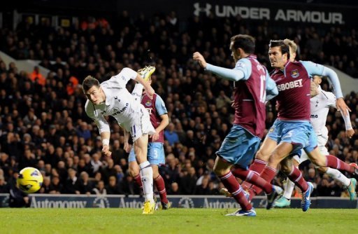 Tottenham Hotspur's Gareth Bale (left) scores a goal against West Ham Tottenham Hotspur's Gareth Bale (left) scores a goal against West Ham
