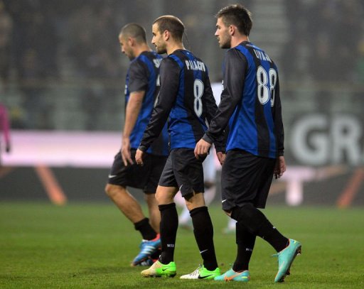 Inter's players Walter Samuel Rodrigo Palacio (C) and Marko Livaja (R) leave the pitch at the end of the match Inter's players Walter Samuel Rodrigo Palacio (C) and Marko Livaja (R) leave the pitch at the end of the match