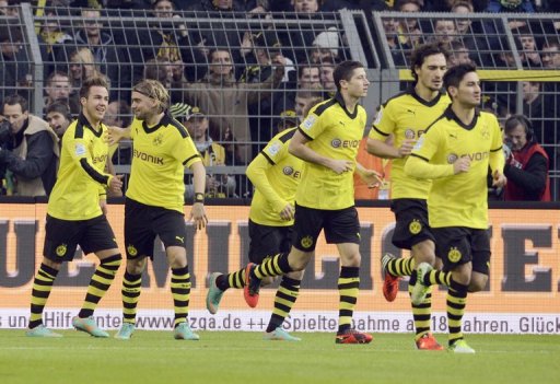 Dortmund enjoyed their third consecutive away win with goals by Marco Reus and Poland striker Robert Lewandowski Dortmund enjoyed their third consecutive away win with goals by Marco Reus and Poland striker Robert Lewandowski