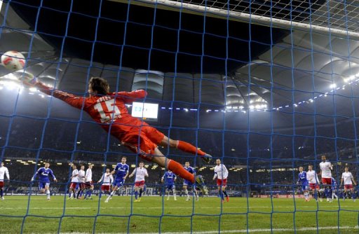 Hamburg's goalkeeper Rene Adler saves a free-kick against Schalke 04 on November 27 Hamburg's goalkeeper Rene Adler saves a free-kick against Schalke 04 on November 27