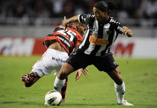 There have been occasional flashes of brilliance from Ronaldinho (right) There have been occasional flashes of brilliance from Ronaldinho (right)