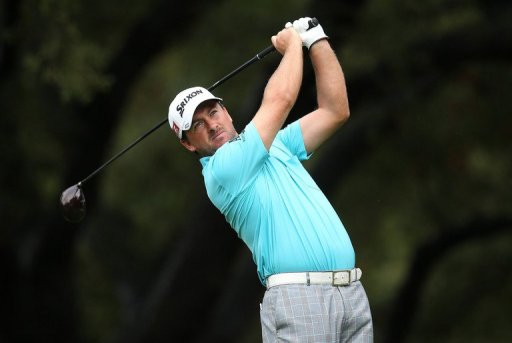 Graeme McDowell finished with seven birdies in a six-under 66 for a three-shot lead Graeme McDowell finished with seven birdies in a six-under 66 for a three-shot lead