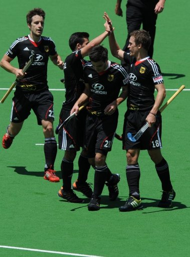 In a Pool A match, Germany held off the fast-finishing New Zealand after scoring all their goals in the first half In a Pool A match, Germany held off the fast-finishing New Zealand after scoring all their goals in the first half