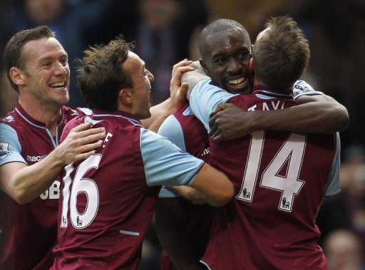 Carlton Cole (second-right) celebrates his equaliser Carlton Cole (second-right) celebrates his equaliser