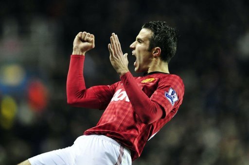 Manchester United's striker Robin Van Persie celebrates scoring Manchester United's striker Robin Van Persie celebrates scoring
