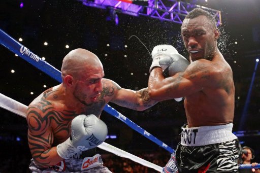 Miguel Cotto (L), a three-division world champion, fell to 37-4 with 30 wins inside the distance Miguel Cotto (L), a three-division world champion, fell to 37-4 with 30 wins inside the distance