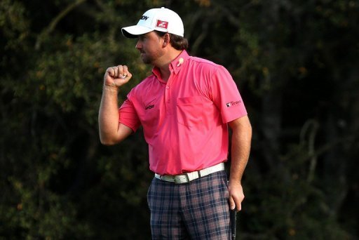Graeme McDowell of Northern Ireland pumps his fist after making a birdie putt on the 18th hole Graeme McDowell of Northern Ireland pumps his fist after making a birdie putt on the 18th hole