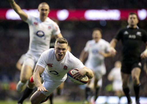 England wing Chris Ashton goes over the try line as New Zealand went down 38-21 at Twickenham England wing Chris Ashton goes over the try line as New Zealand went down 38-21 at Twickenham