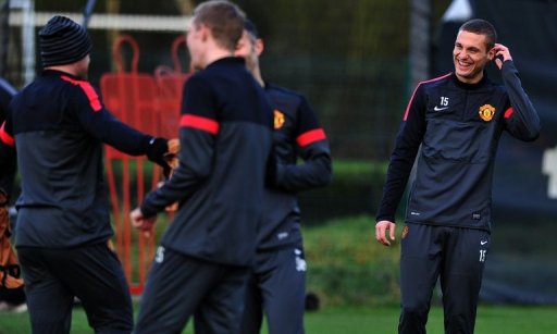 Vidic (R) trained with United on Tuesday morning ahead of the Group H encounter at Old Trafford Vidic (R) trained with United on Tuesday morning ahead of the Group H encounter at Old Trafford