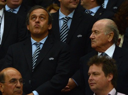 Michael Platini (left) suggests staging the European championships across 12 or 13 cities Michael Platini (left) suggests staging the European championships across 12 or 13 cities