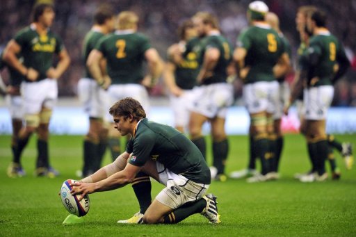 S. Africa's fly-half Pat Lambie prepares the ball before kicking a penalty at a match against England in November 2012 S. Africa's fly-half Pat Lambie prepares the ball before kicking a penalty at a match against England in November 2012