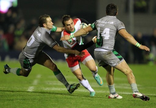 Biarritz's Marcelo Bosch (C) fights for the ball with Connacht's Dan Parks (L) and Tiernan O'Halloran Biarritz's Marcelo Bosch (C) fights for the ball with Connacht's Dan Parks (L) and Tiernan O'Halloran