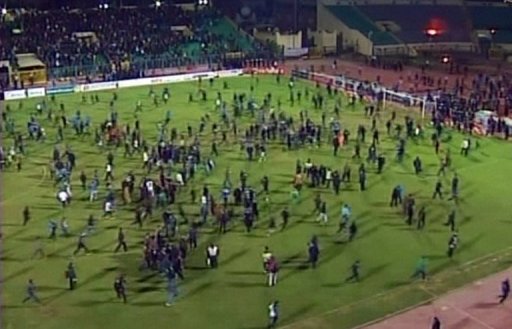 Al Masry fans stormed the pitch after their team beat the visitors from Cairo 3-1 Al Masry fans stormed the pitch after their team beat the visitors from Cairo 3-1