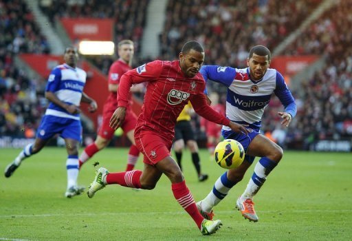 Southampton's midfielder Jason Puncheon (L) clashes with Reading's defender Adrian Mariappa Southampton's midfielder Jason Puncheon (L) clashes with Reading's defender Adrian Mariappa