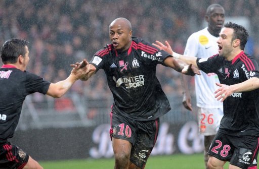 Marseille's Andre Ayew (C) is congratulated by teammates after scoring against Brest, on December 2 Marseille's Andre Ayew (C) is congratulated by teammates after scoring against Brest, on December 2