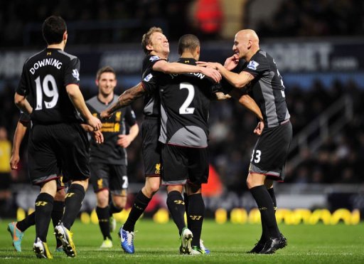 Liverpool's Glen Johnson (2nd R) celebrates scoring with Jonjo Shelvey (R) and Lucas Leiva (3rd R) Liverpool's Glen Johnson (2nd R) celebrates scoring with Jonjo Shelvey (R) and Lucas Leiva (3rd R)