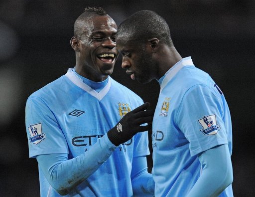 Mario Balotelli (left) speaks to Yaya Toure at the Etihad Stadium on February 25, 2012. Mario Balotelli (left) speaks to Yaya Toure at the Etihad Stadium on February 25, 2012.