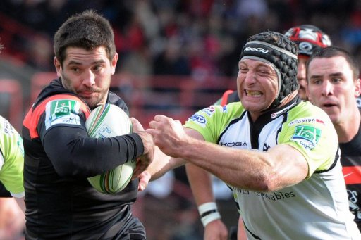 Toulouse's Florian Fritz (L) breaks away from Ospreys' Ian Gouch during their match on December 8, 2012 Toulouse's Florian Fritz (L) breaks away from Ospreys' Ian Gouch during their match on December 8, 2012