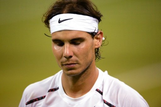 Rafael Nadal trudges off court after losing his second round match against Lukas Rosol at Wimbledon on June 28, 2012 Rafael Nadal trudges off court after losing his second round match against Lukas Rosol at Wimbledon on June 28, 2012