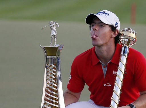 Rory McIlroy poses with his trophy after winning the DP World Tour Championship in Dubai on November 25, 2012 Rory McIlroy poses with his trophy after winning the DP World Tour Championship in Dubai on November 25, 2012