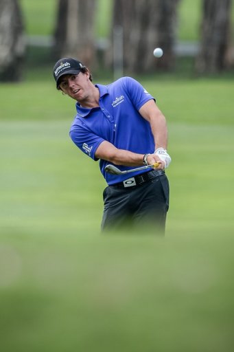 World number one Rory McIlroy hits a chip shot during the second day of the UBS Hong Kong Open on November 16, 2012 World number one Rory McIlroy hits a chip shot during the second day of the UBS Hong Kong Open on November 16, 2012