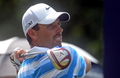 Charl Schwartzel of South Africa hits a shot on December 8, 2012 Charl Schwartzel of South Africa hits a shot on December 8, 2012