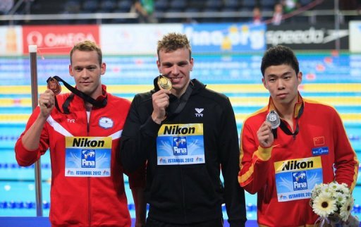 Paul Biedermann of Germany, Yun Hao of China (R) and Mads Glaesner (L) on December 14, 2012 Paul Biedermann of Germany, Yun Hao of China (R) and Mads Glaesner (L) on December 14, 2012