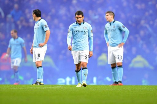 Man City's players, seen here after their loss to Man United at the Etihad stadium in Manchester, on December 9, 2012 Man City's players, seen here after their loss to Man United at the Etihad stadium in Manchester, on December 9, 2012