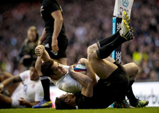 England's Brad Barritt (C) celebrates scoring a try against New Zealand, at Twickenham Stadium, on December 1, 2012 England's Brad Barritt (C) celebrates scoring a try against New Zealand, at Twickenham Stadium, on December 1, 2012